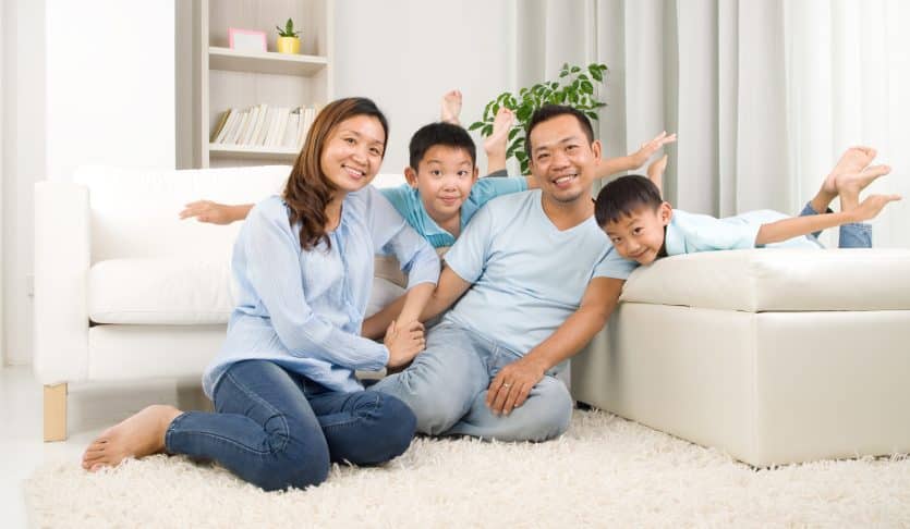 Asian family having fun at home